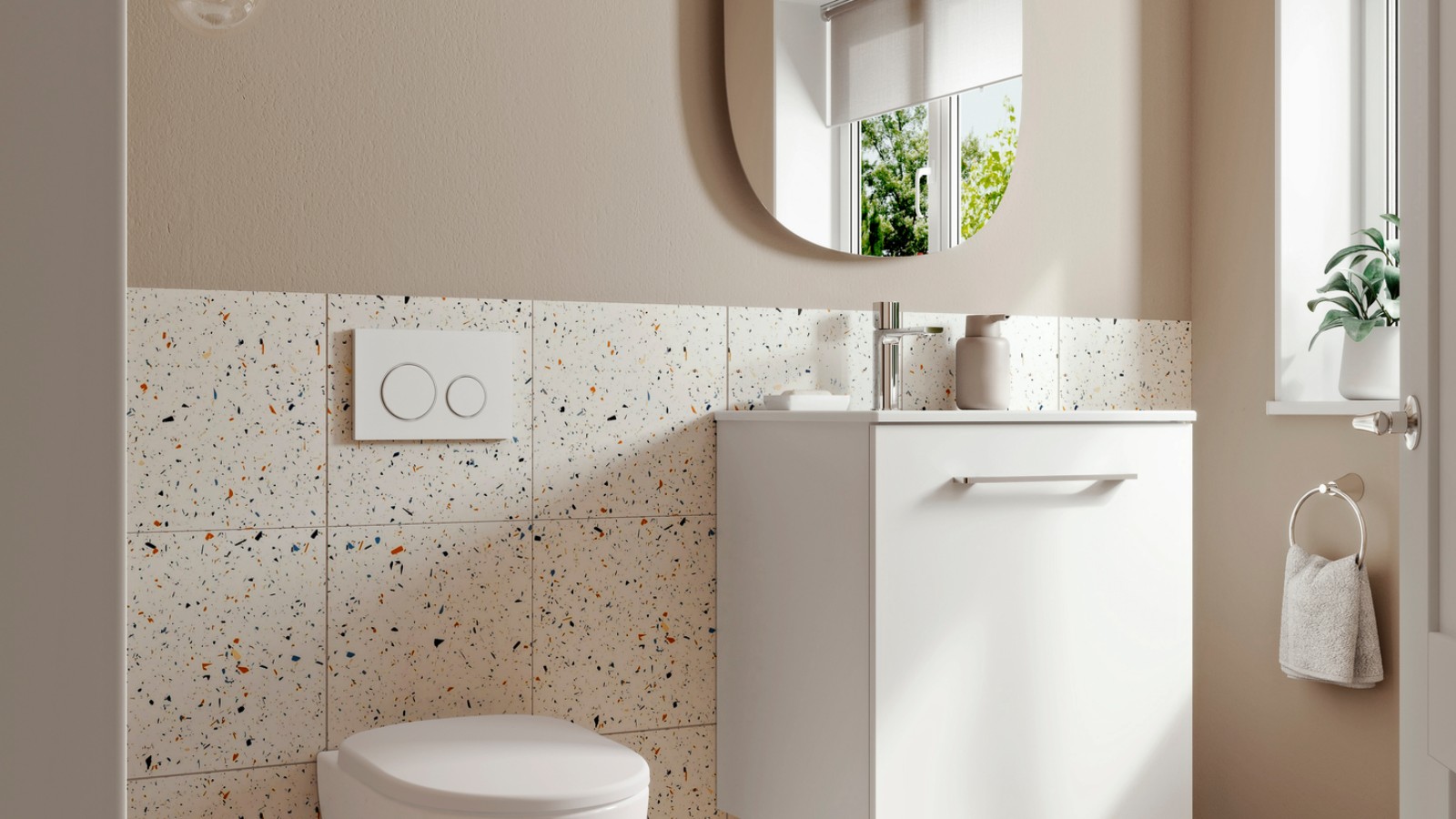 Litet badrum från Geberit med vägghängd WC och underskåp Litet badrum från Geberit med vägghängd WC och underskåp