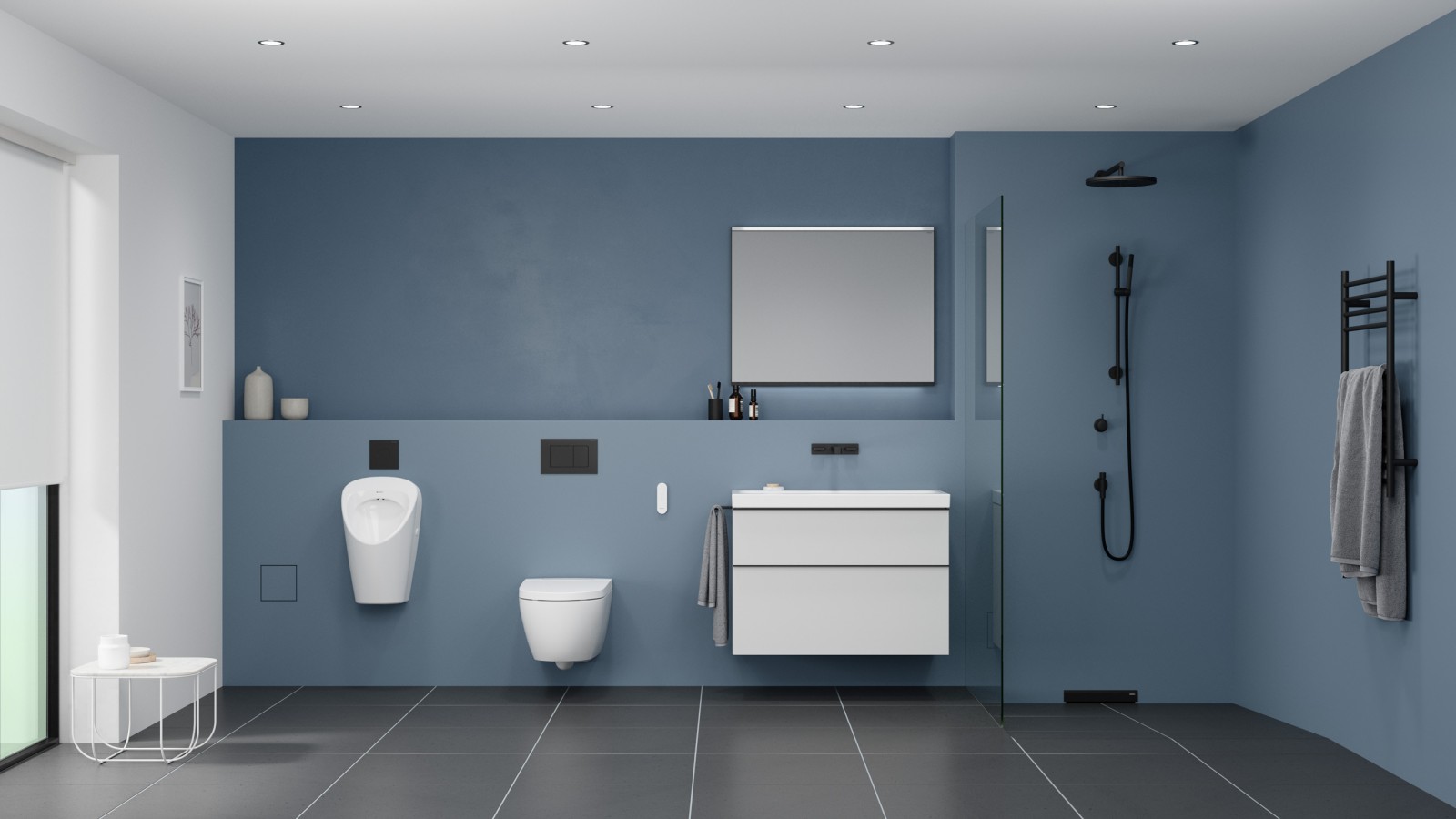 Badrum med urinal, WC och tvättställ Badrum med urinal, WC och tvättställ